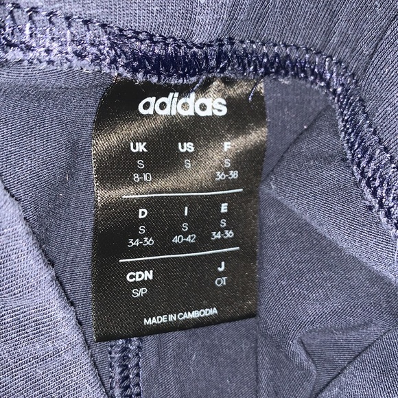 Adidas Navy blue leggings w/,”ADIDAS ,” written in white down front lower leg. - Picture 10 of 10